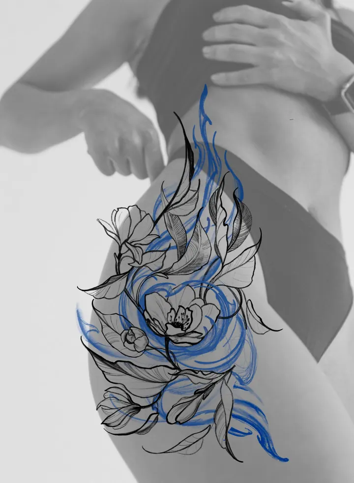 Floral tattoo design with blue flowing lines shown on the thigh