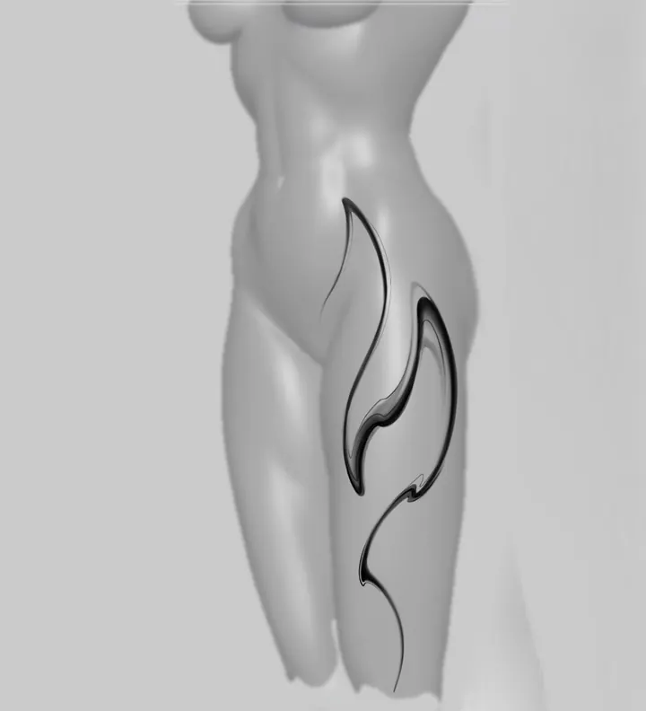 Elongated abstract tattoo design shown on the thigh